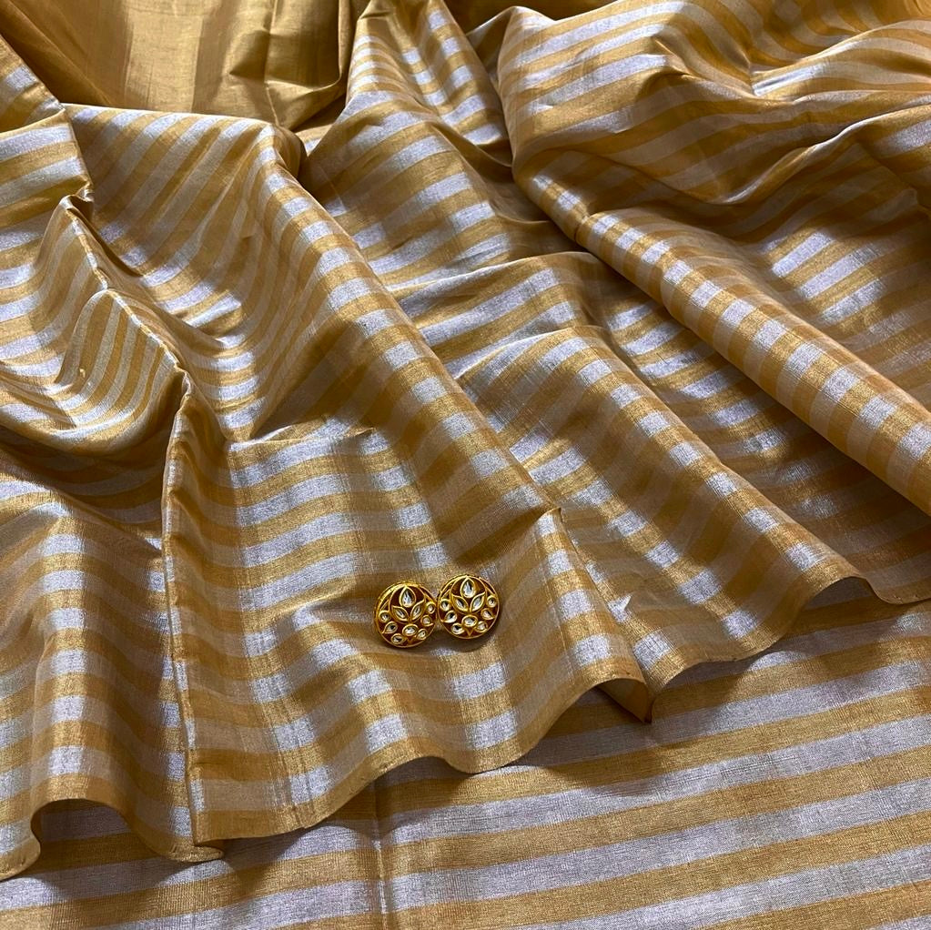 Gold and silver chanderi tissue silk saree with zari stripes all over