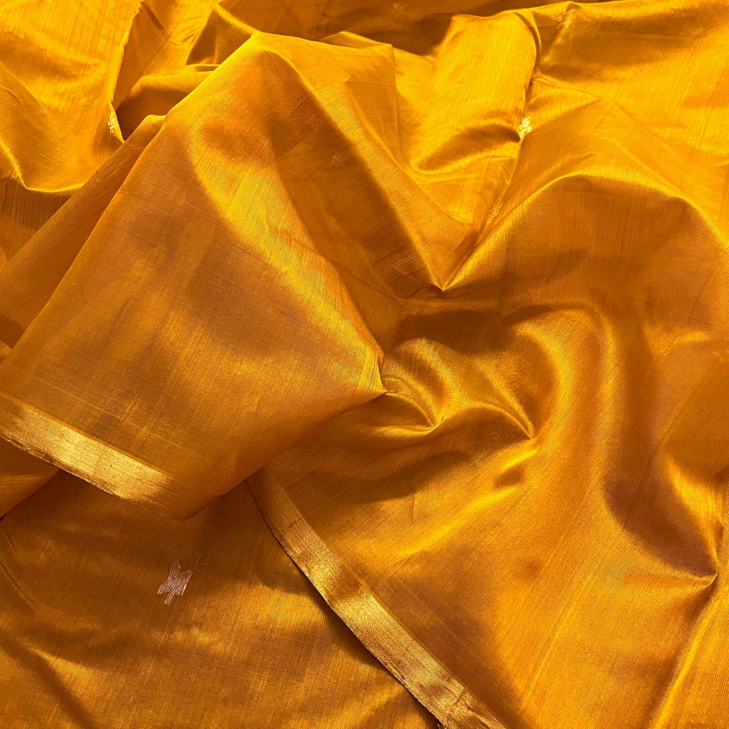 Mustard gold chanderi silk saree with flower bootis all over