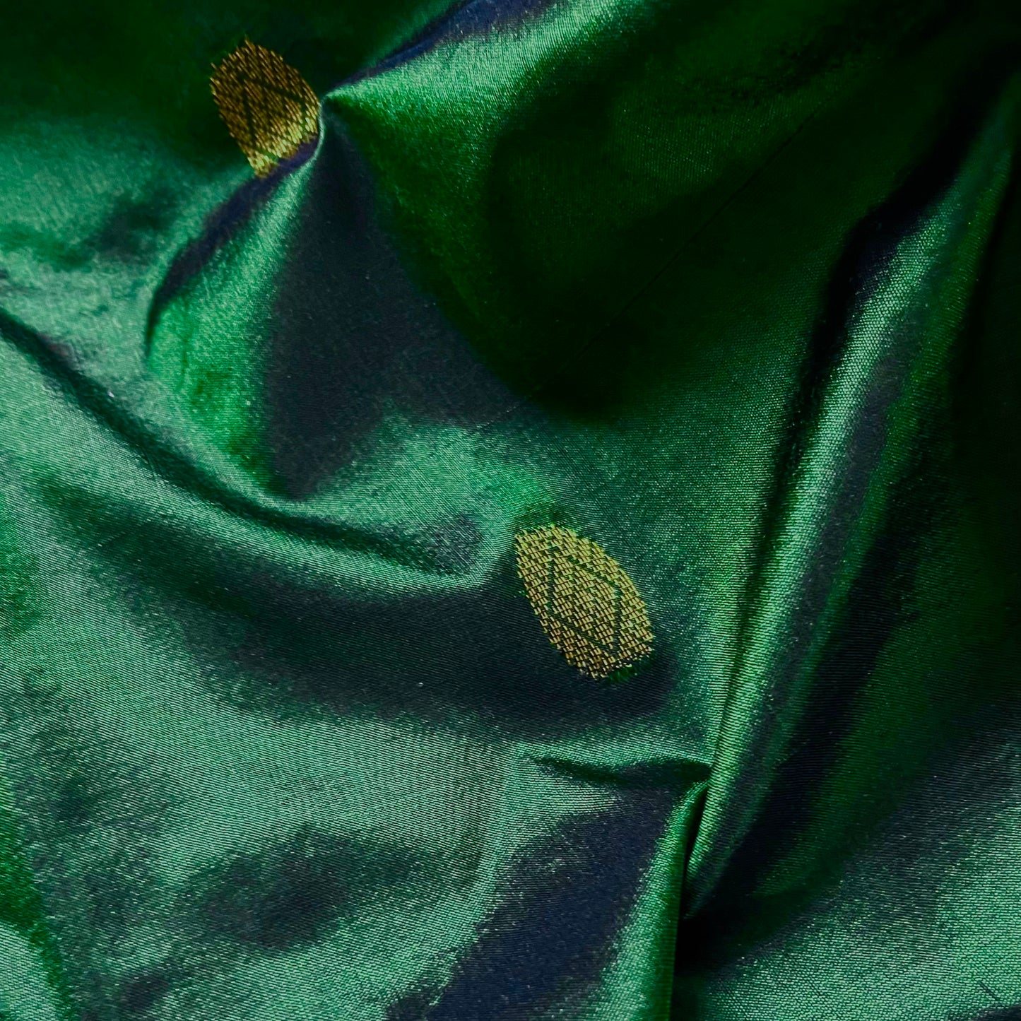 Dark green maheshwari silk saree with zari bootis all over