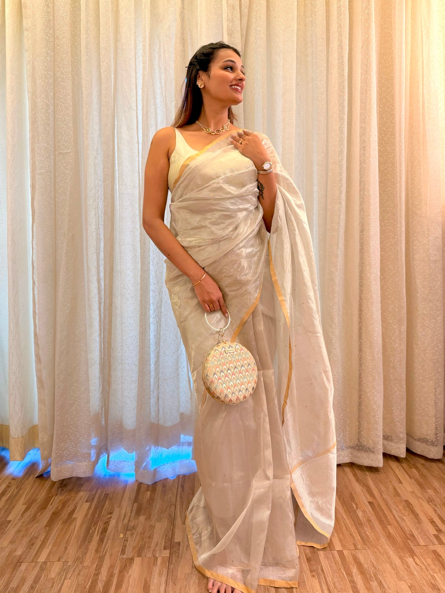 Chantilly cream Chanderi tissue silk saree with zari bootis all over