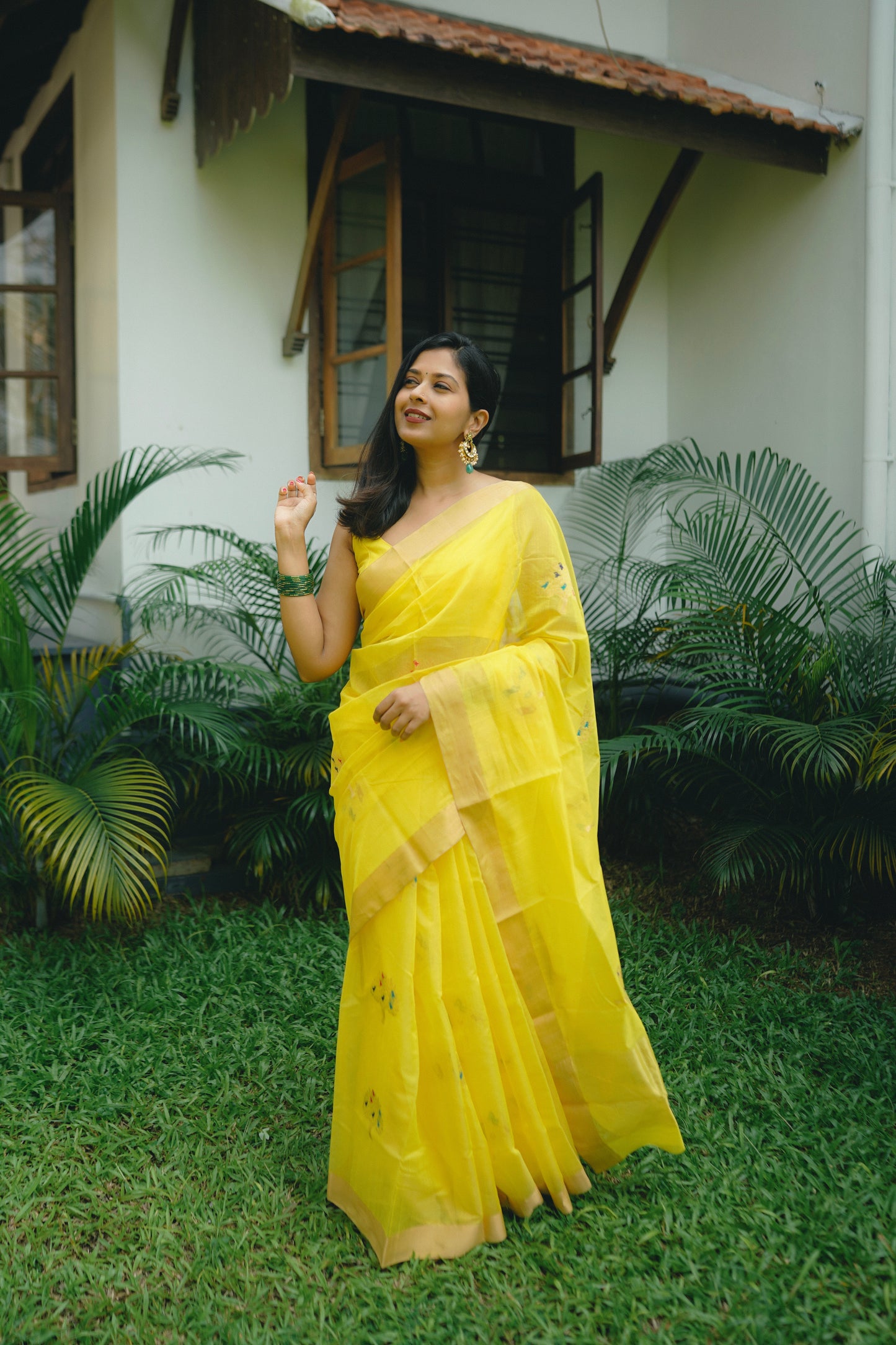 Yellow Chanderi saree with birds on tree motifs all over