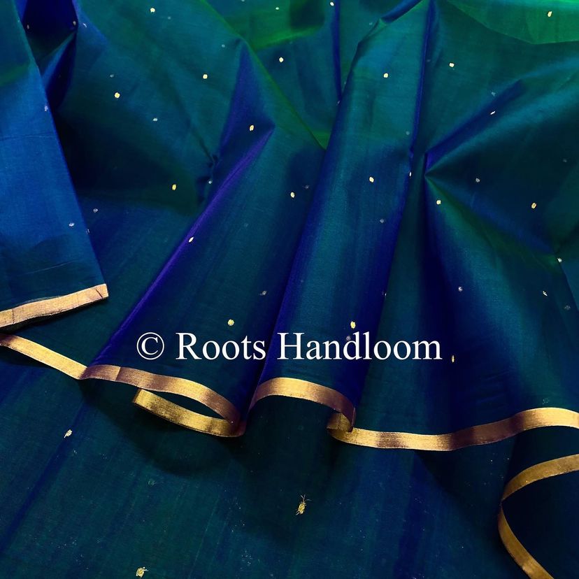 Peacock blue and green dual tone Chanderi organza silk saree with zari bootis all over