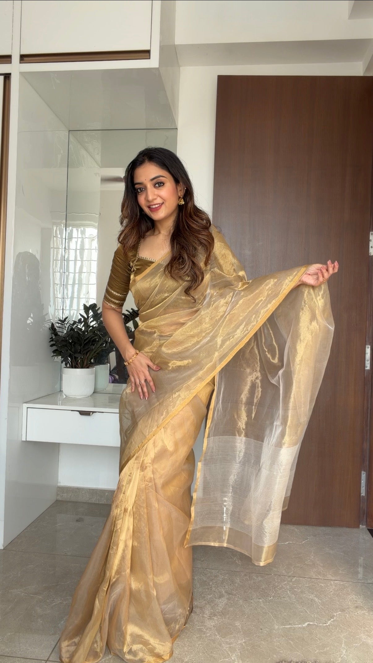 Gold Chanderi tissue silk saree with zari lines on pallu