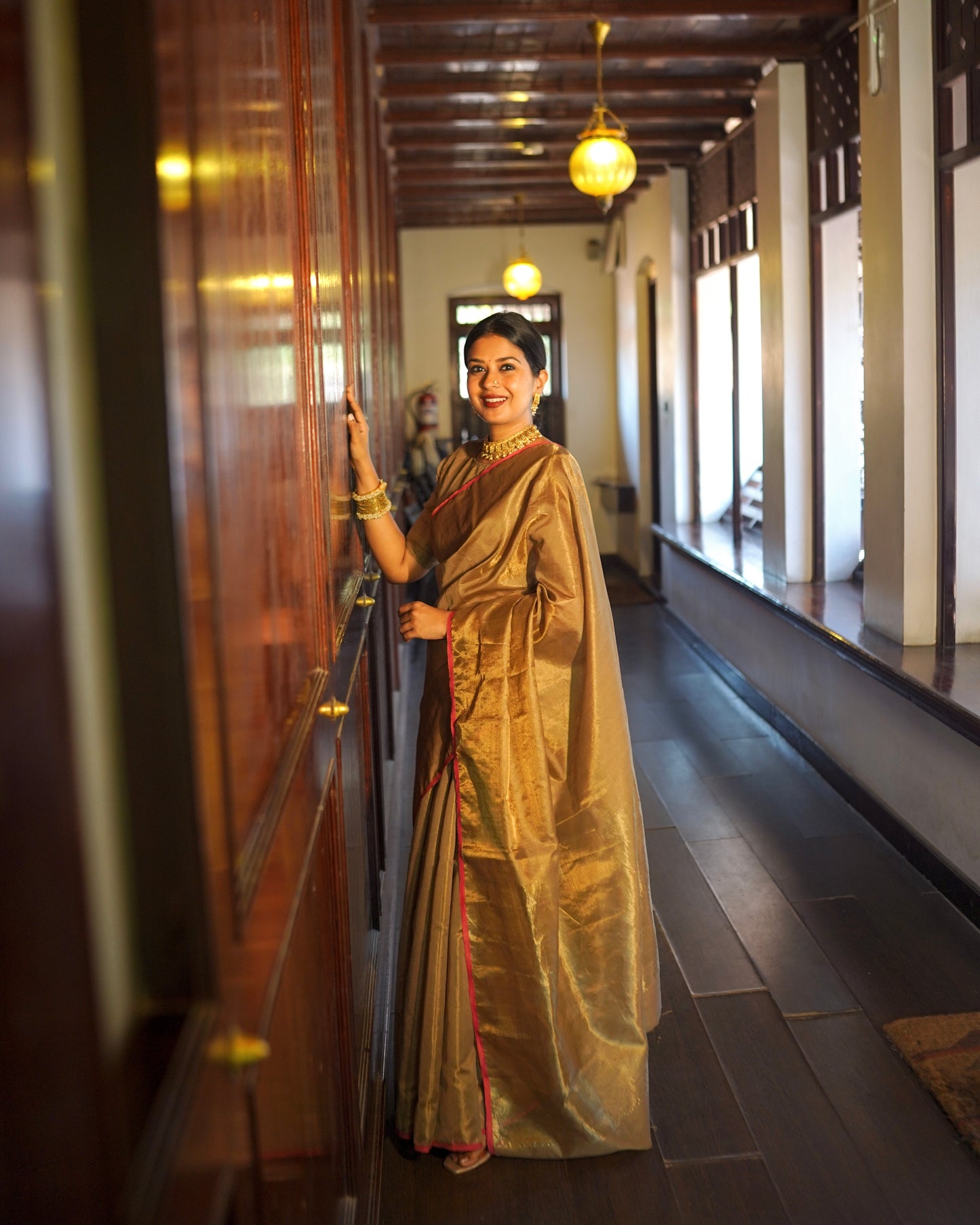 Antique gold & pink maheshwari tissue silk saree with zari lines on pallu