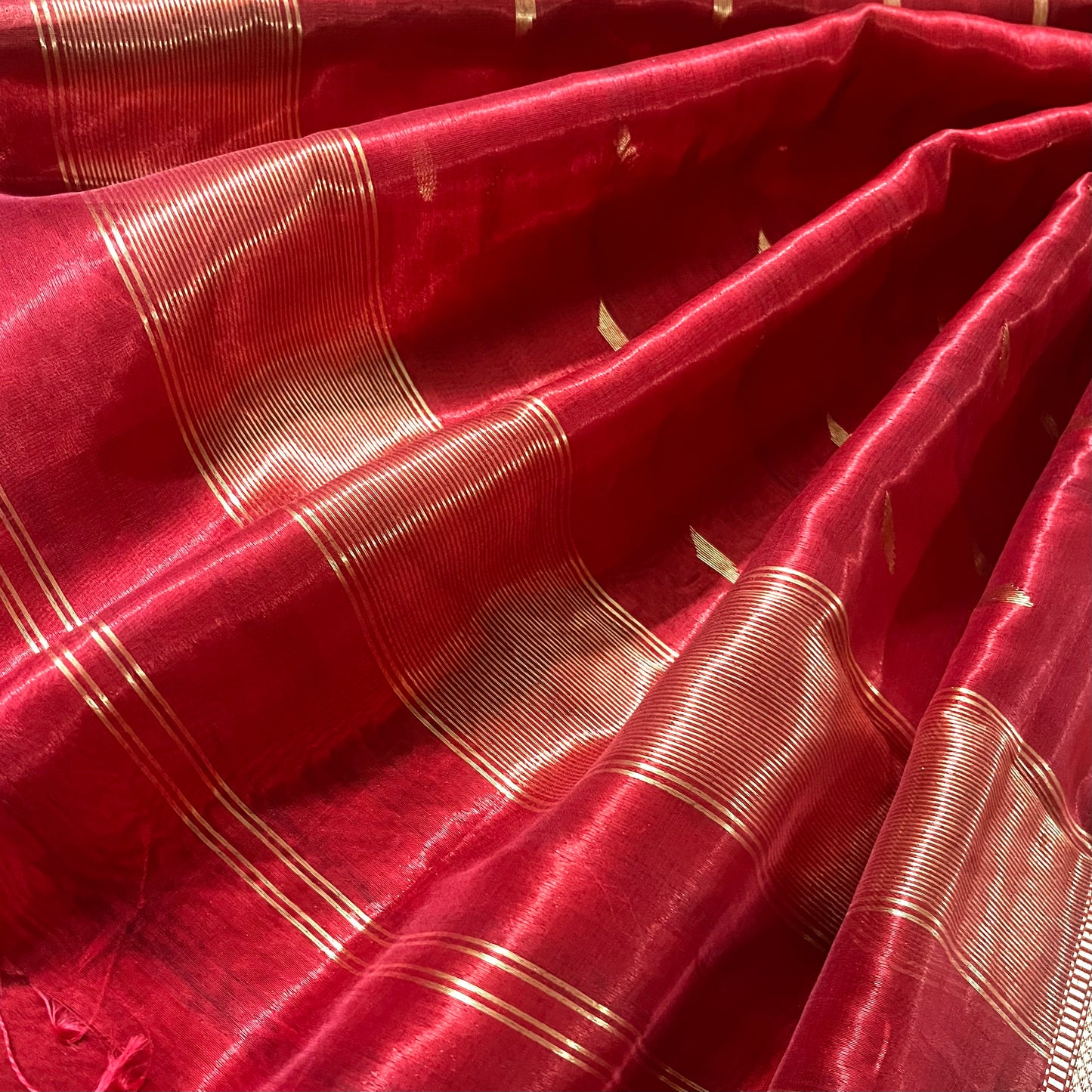 Red Maheshwari tissue silk saree with zari bootis all over