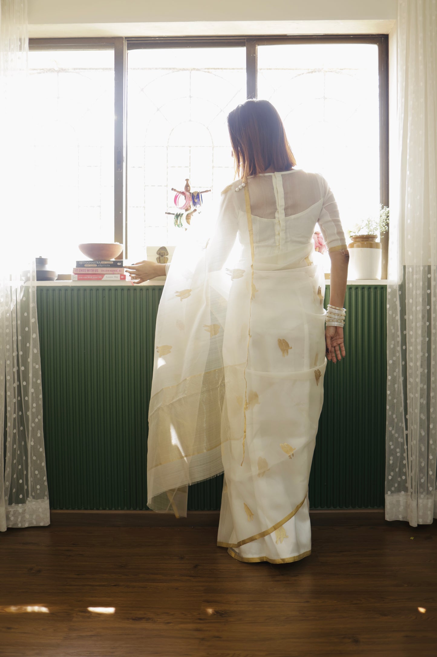 Off white and gold chanderi organza silk saree with bird motifs all over