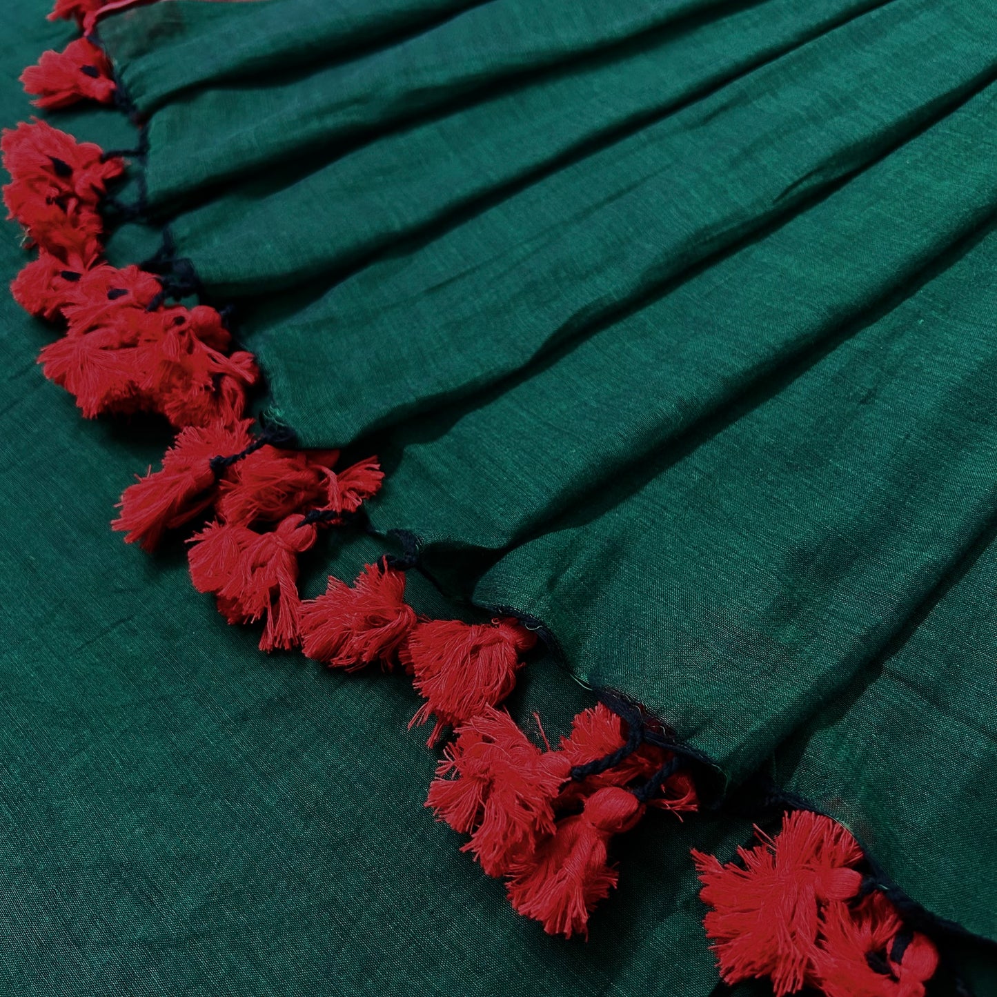 Dark green and red mulmul saree