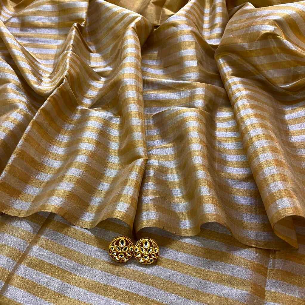 Gold and silver chanderi tissue silk saree with zari stripes all over