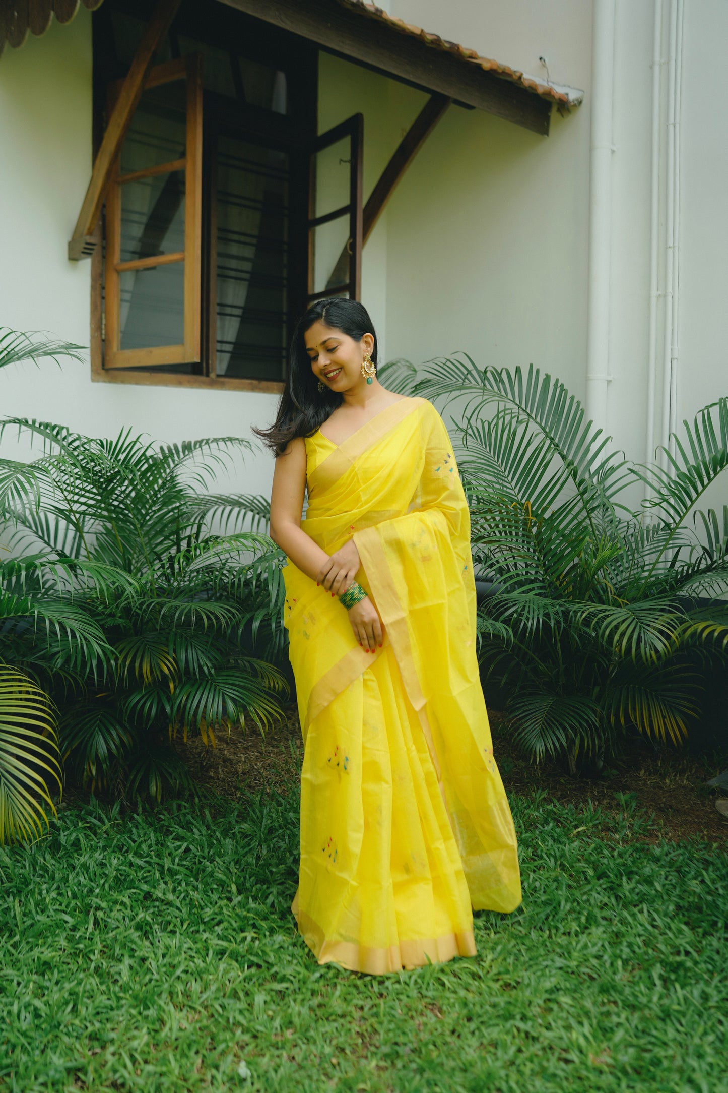 Yellow Chanderi saree with birds on tree motifs all over