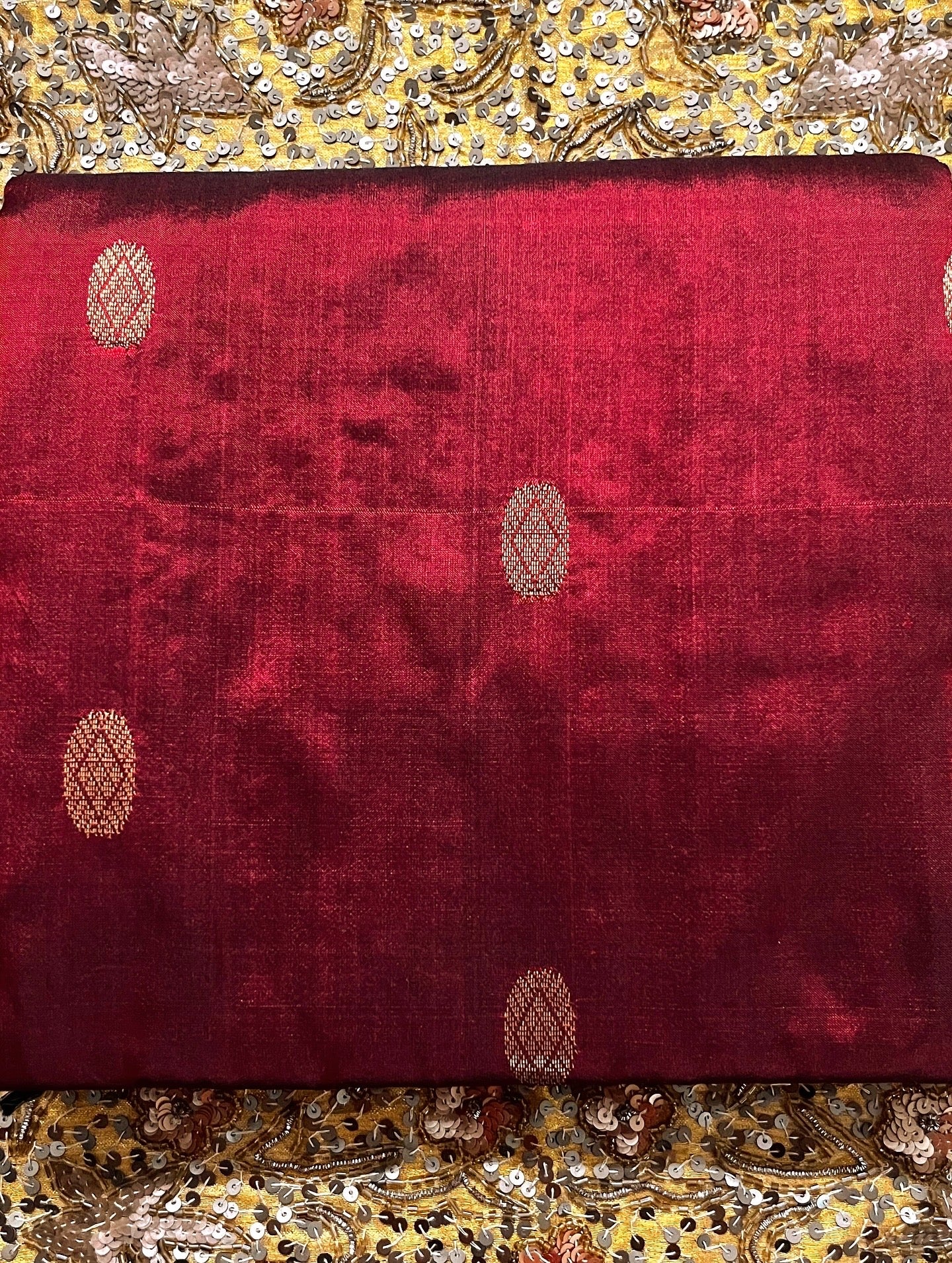 Deep maroon Maheshwari silk saree with zari bootis all over