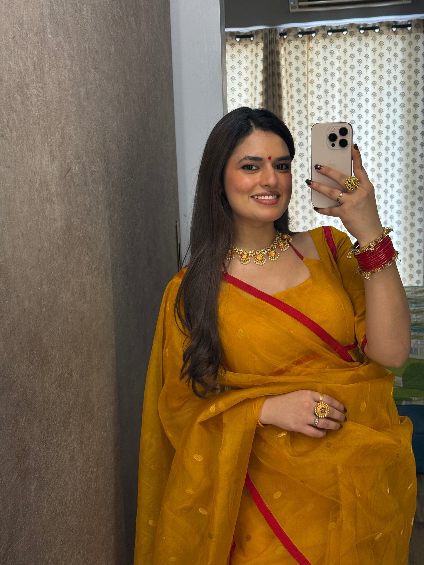 Mustard red Chanderi silk saree with zari bootis all over