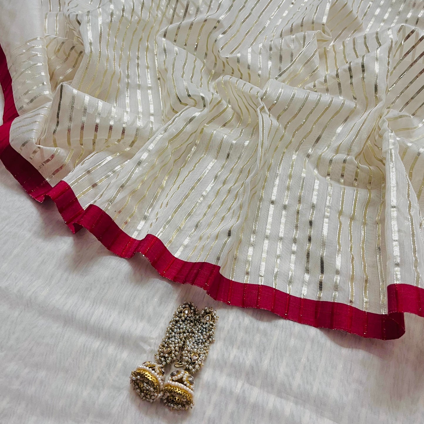 Off white & red chanderi saree with intricate gota work all over