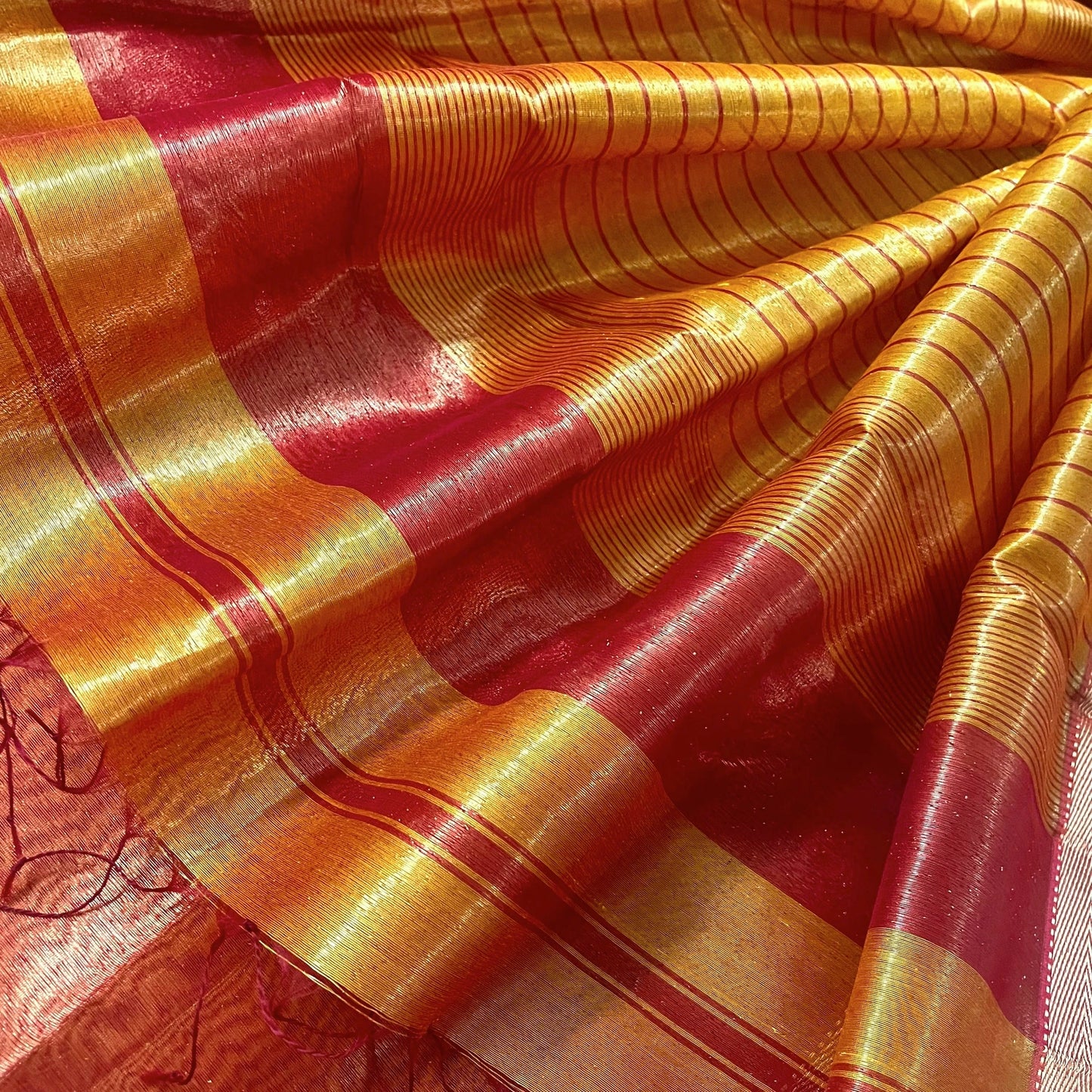 Mustard and red maheshwari tissue silk saree with zari pattern on pallu