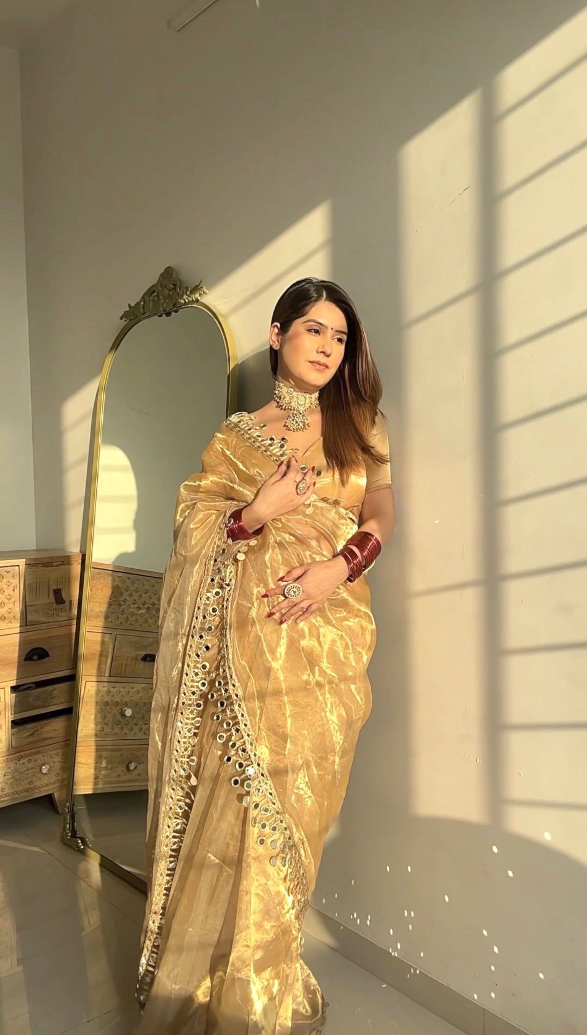 Molten gold chanderi tissue silk saree with dangling mirror work border