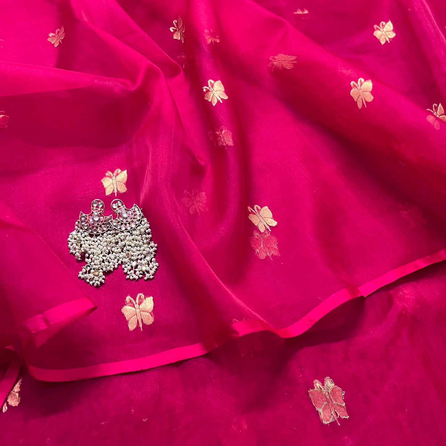 Rani pink Chanderi silk saree with butterfly motifs all over
