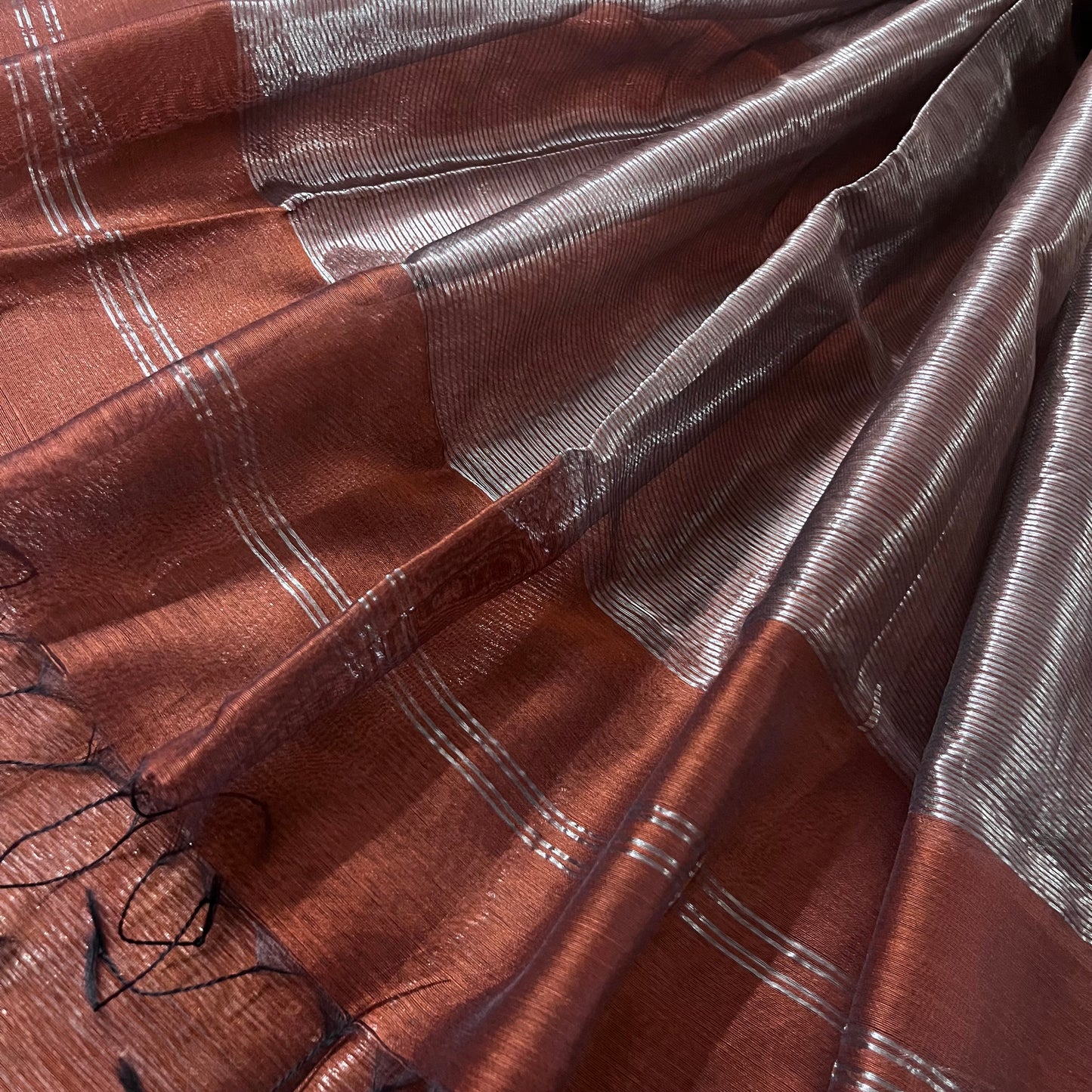 Chocolate brown Maheshwari saree with silver zari lines all over