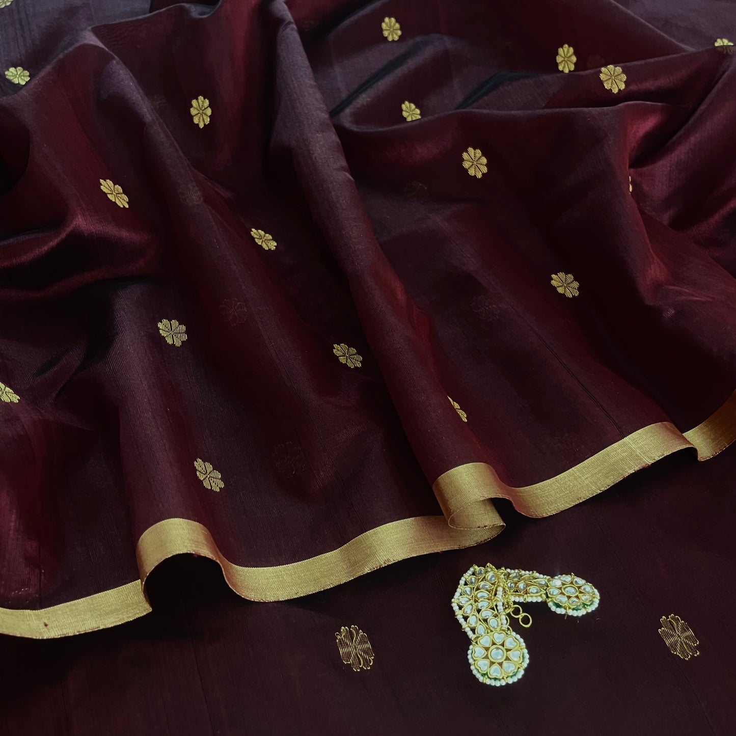 Mahogany Chanderi silk saree with flower bootis all over