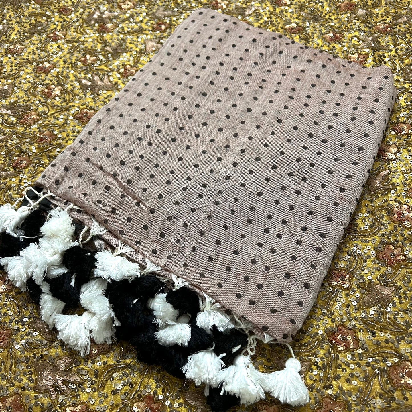 Greyish beige and black polka dot mulmul saree