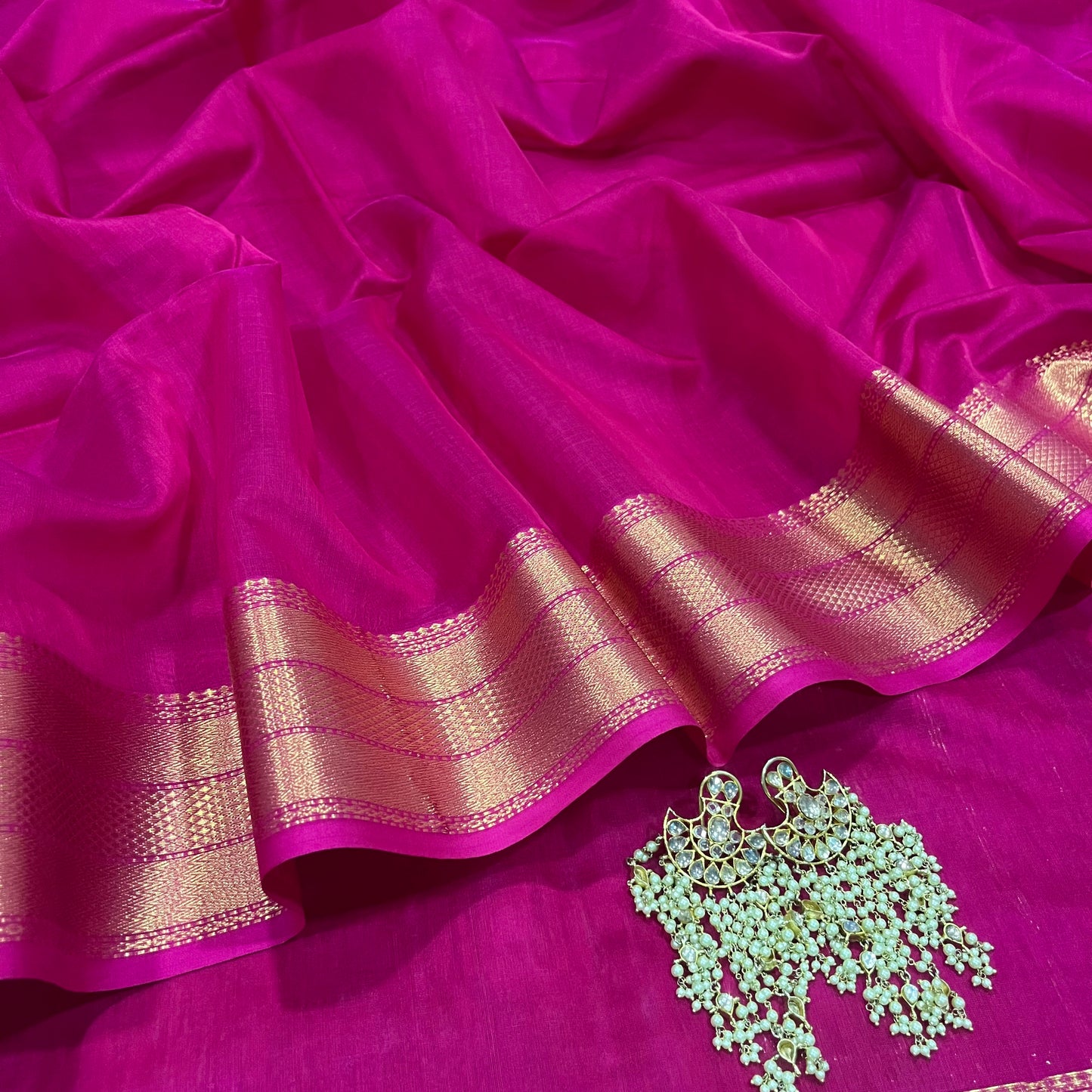 Rani pink Maheshwari saree with zari border
