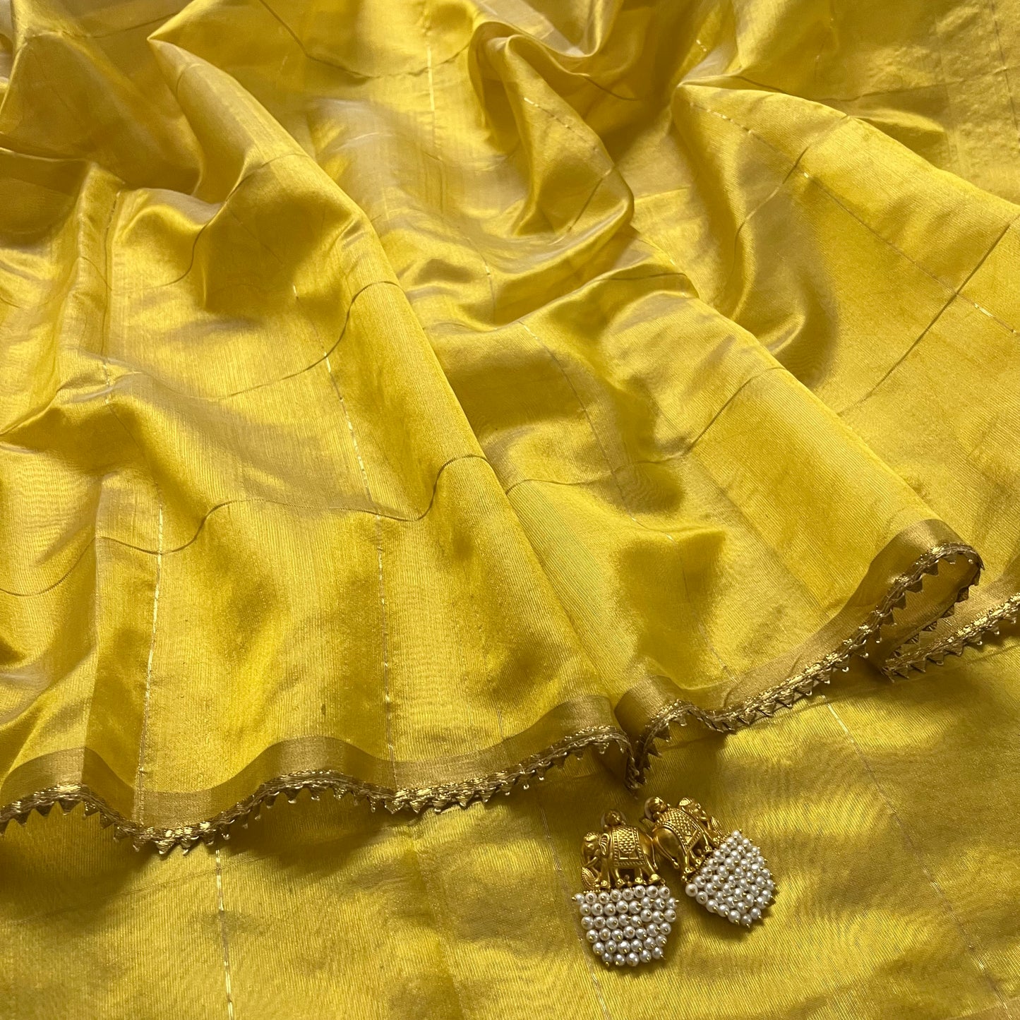 Butter yellow Chanderi silk saree with zari checks all over