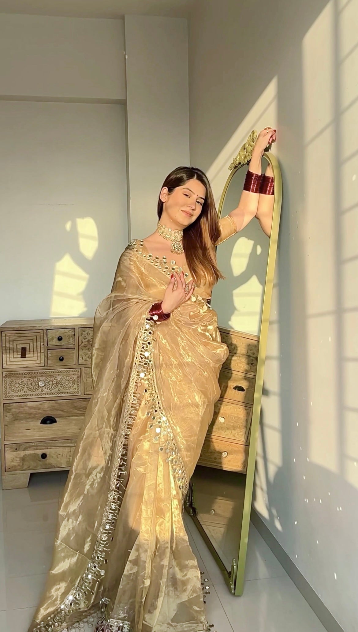 Molten gold chanderi tissue silk saree with dangling mirror work border