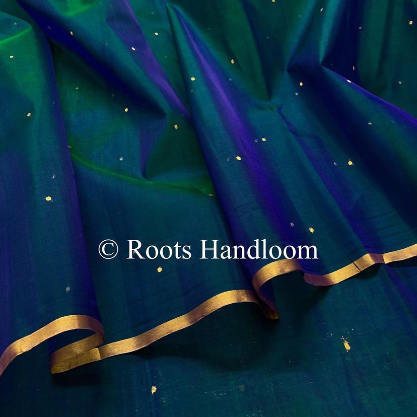 Peacock blue and green dual tone Chanderi organza silk saree with zari bootis all over