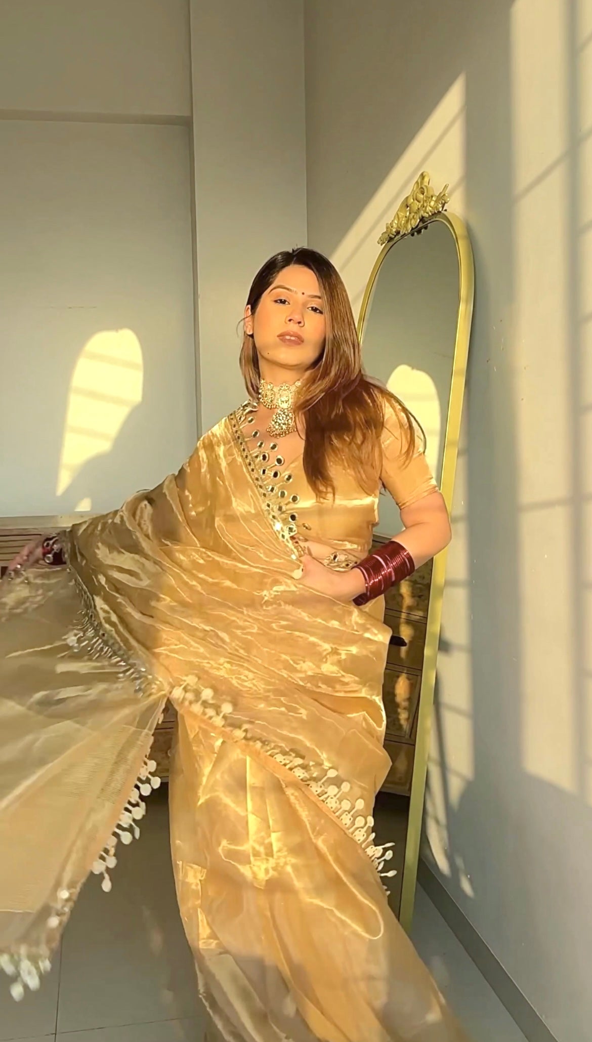 Molten gold chanderi tissue silk saree with dangling mirror work border