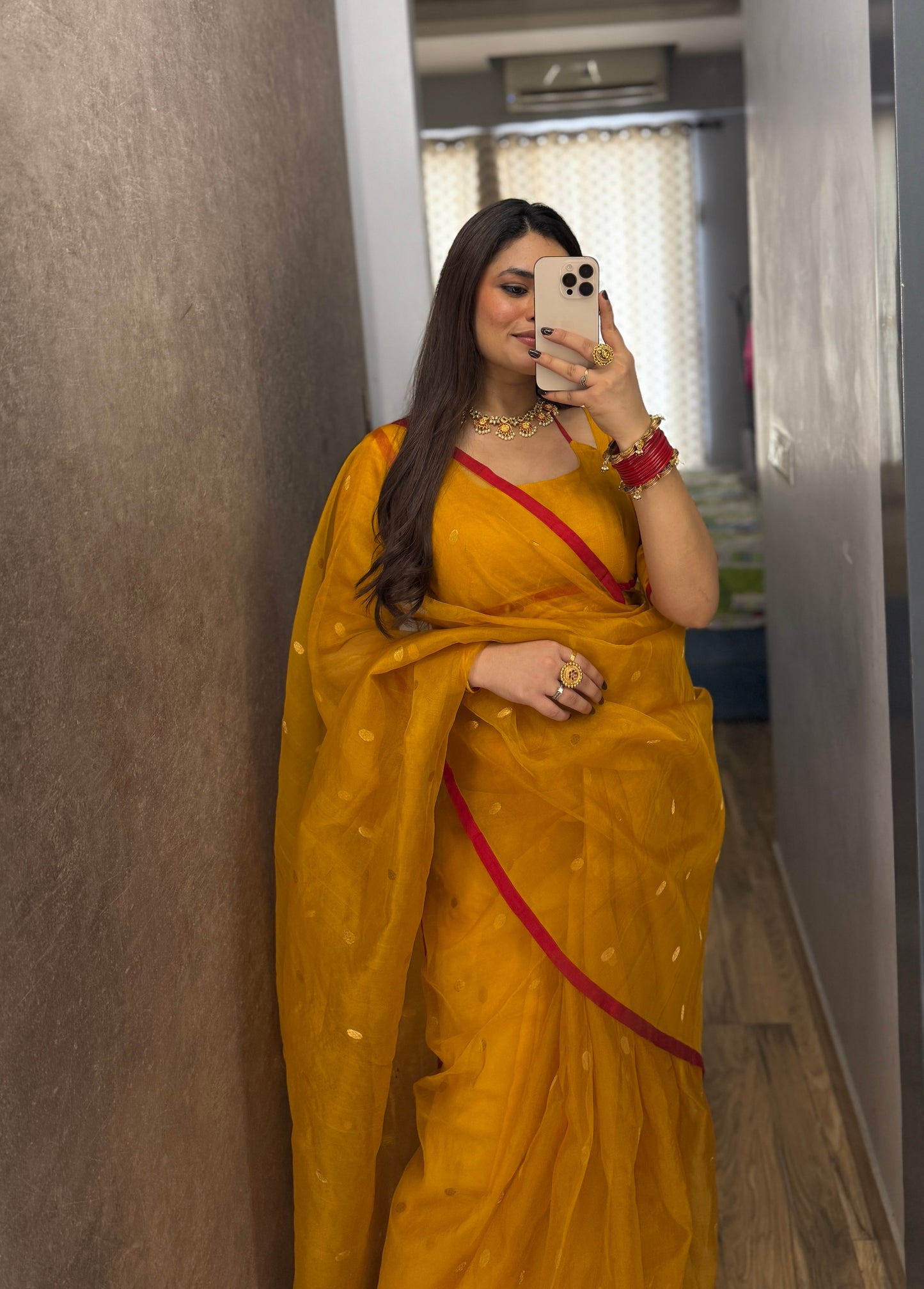 Mustard red Chanderi silk saree with zari bootis all over