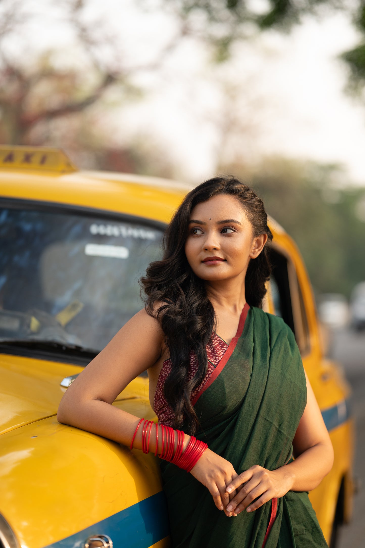 Dark green and red mulmul saree