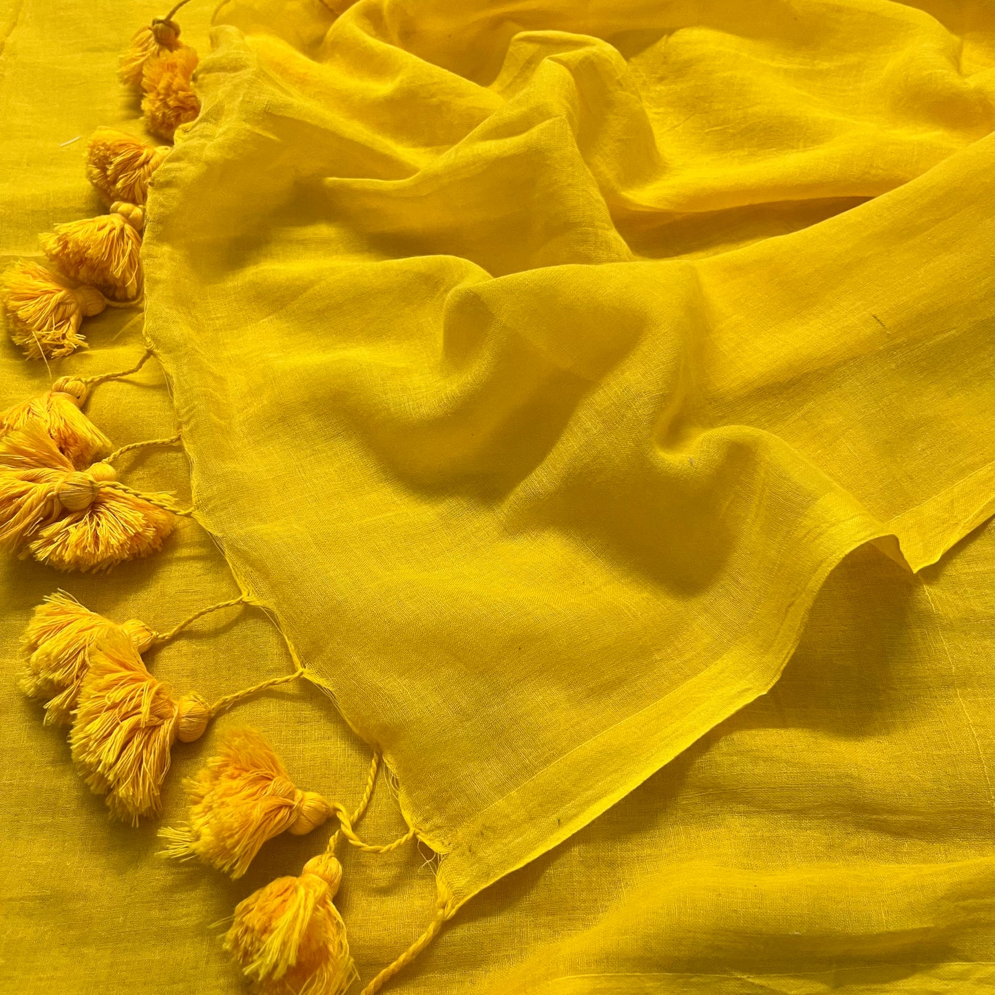 Yellow mulmul saree