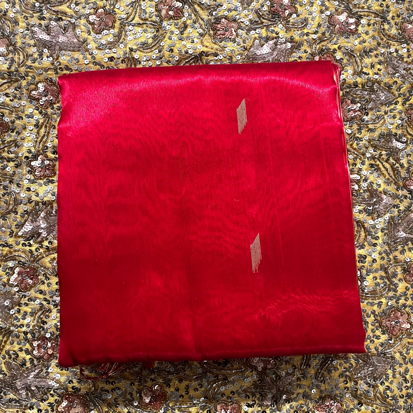 Red Maheshwari tissue silk saree with zari bootis all over