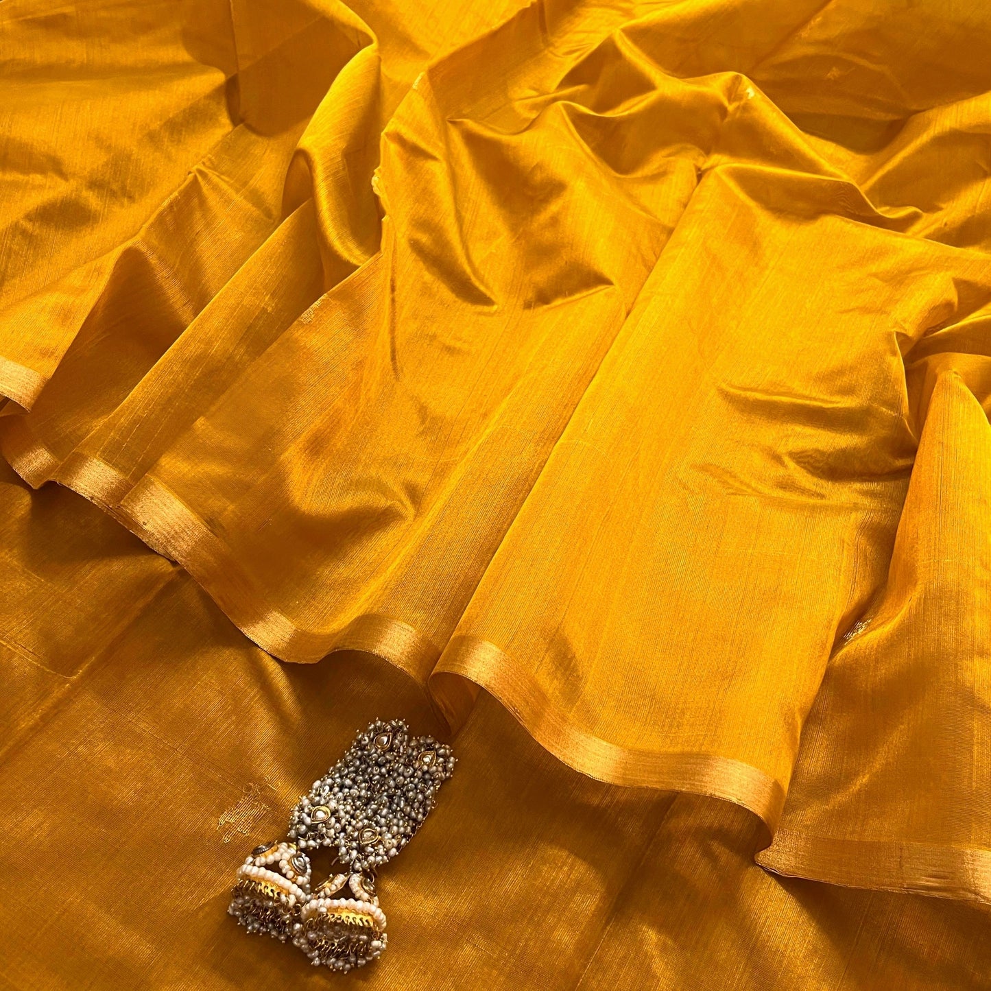 Mustard gold chanderi silk saree with flower bootis all over