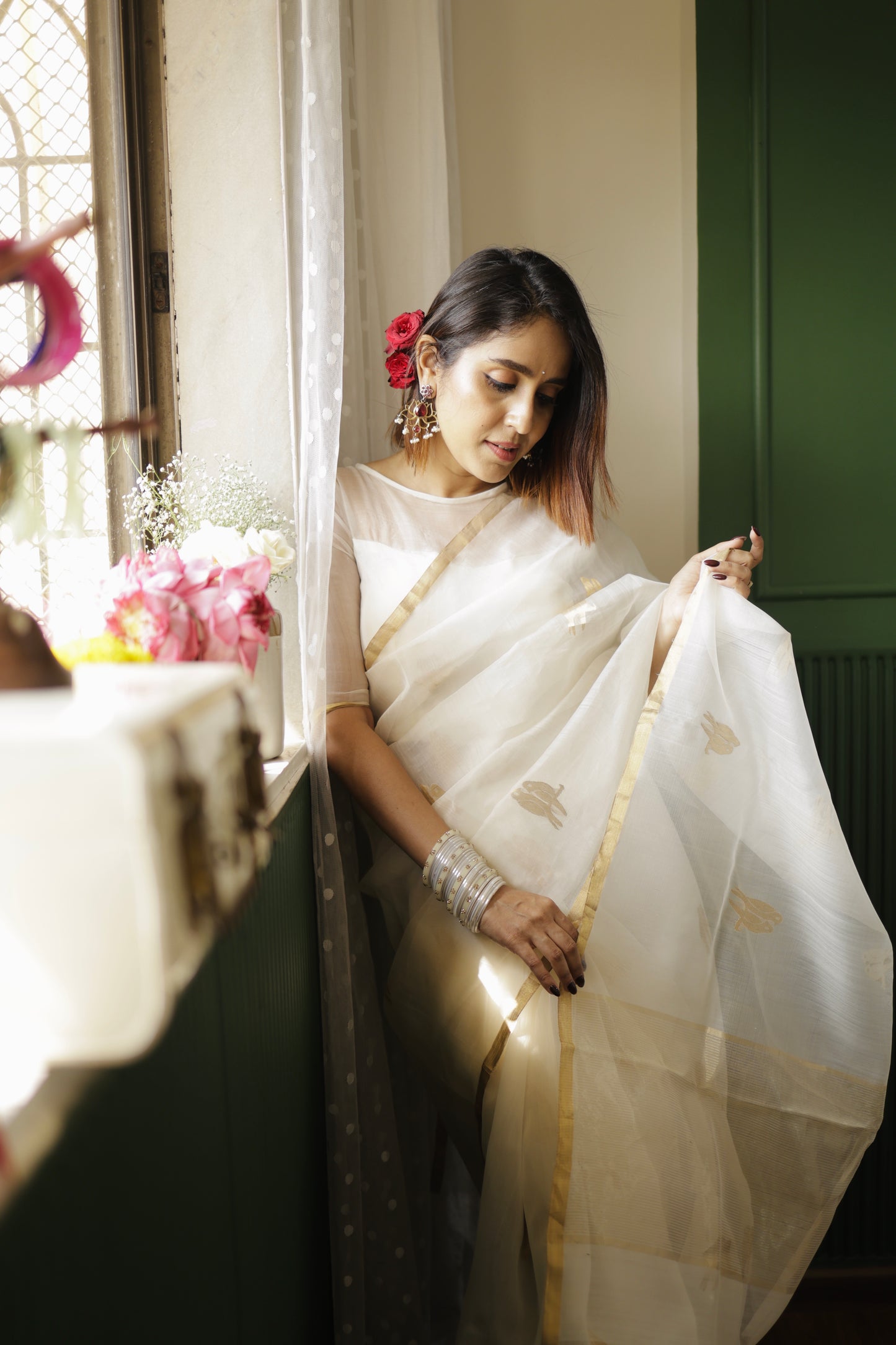 Off white and gold chanderi organza silk saree with bird motifs all over