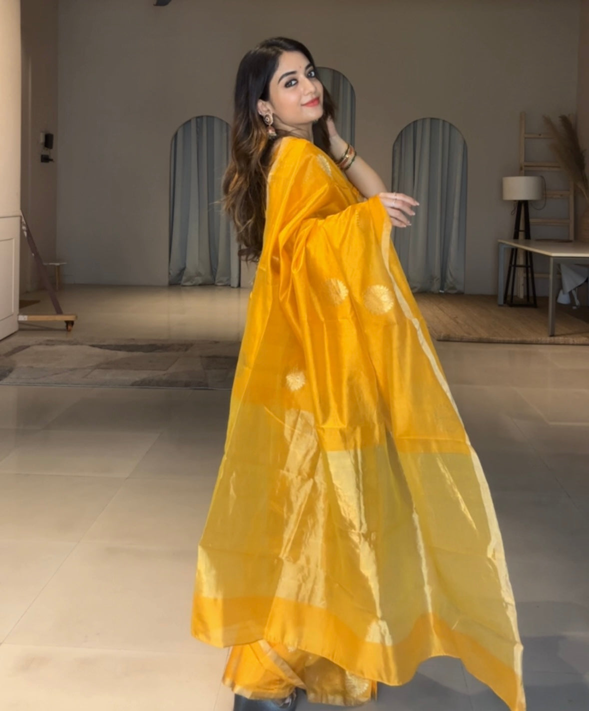 Yellow chanderi silk saree with mor motifs all over