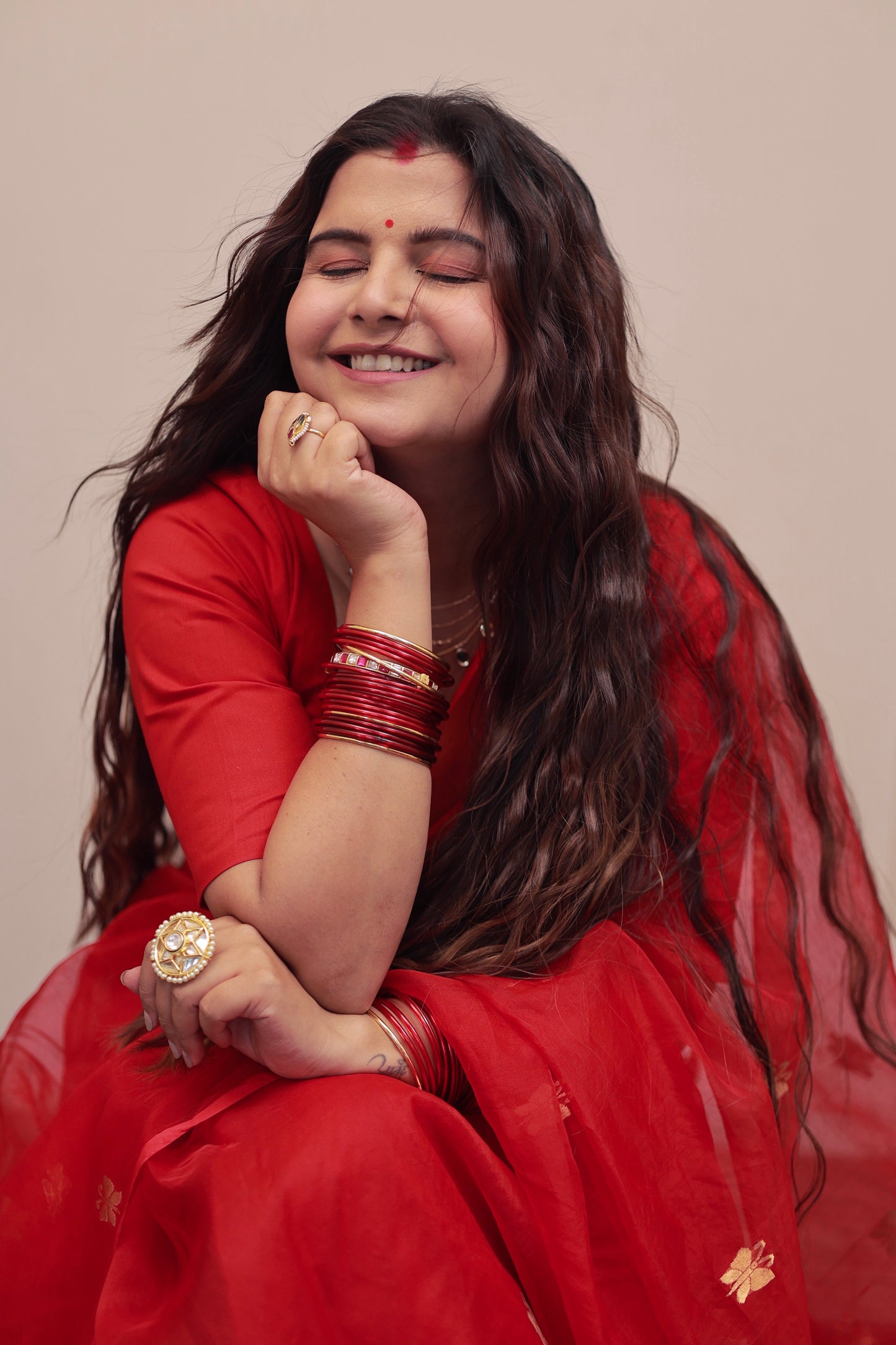 Red chanderi organza silk saree with butterfly motifs all over