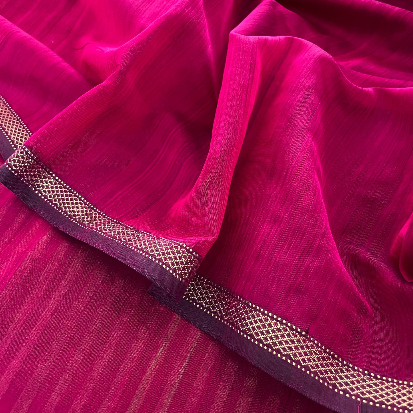 Dark pink Maheshwari saree with zari stripes all over