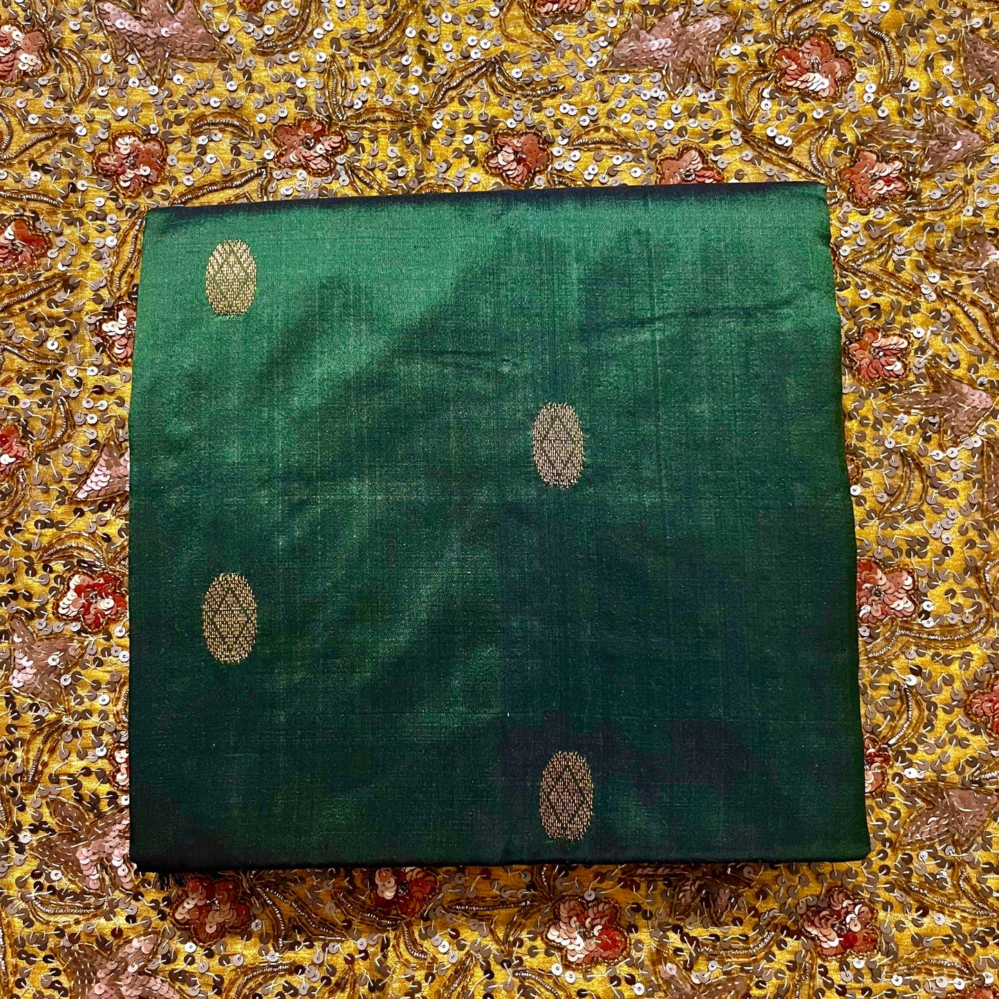 Dark green maheshwari silk saree with zari bootis all over