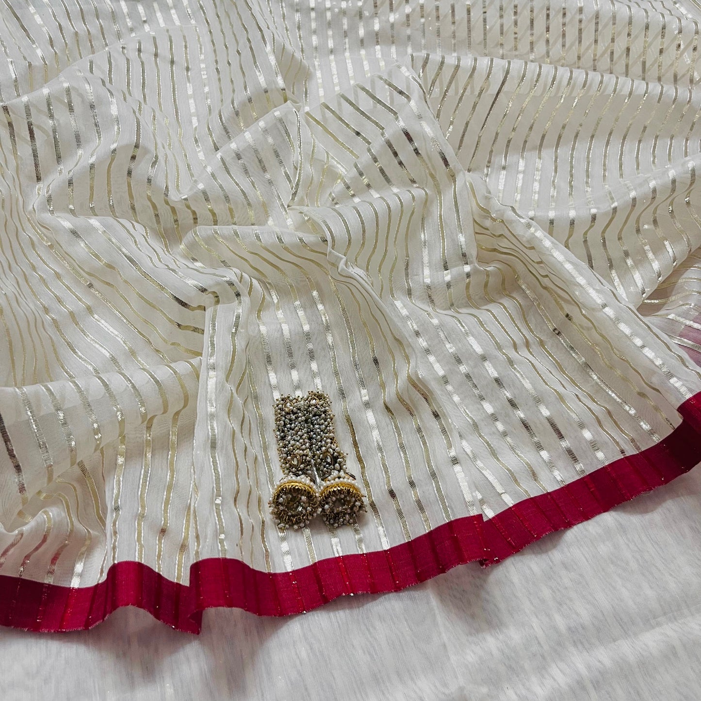 Off white & red chanderi saree with intricate gota work all over