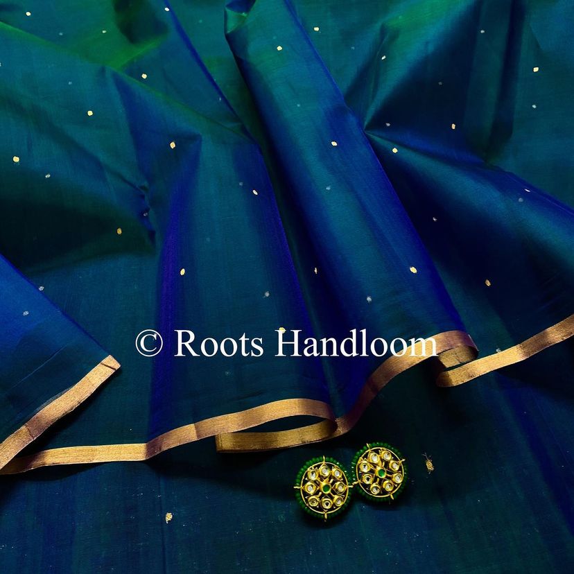 Peacock blue and green dual tone Chanderi organza silk saree with zari bootis all over