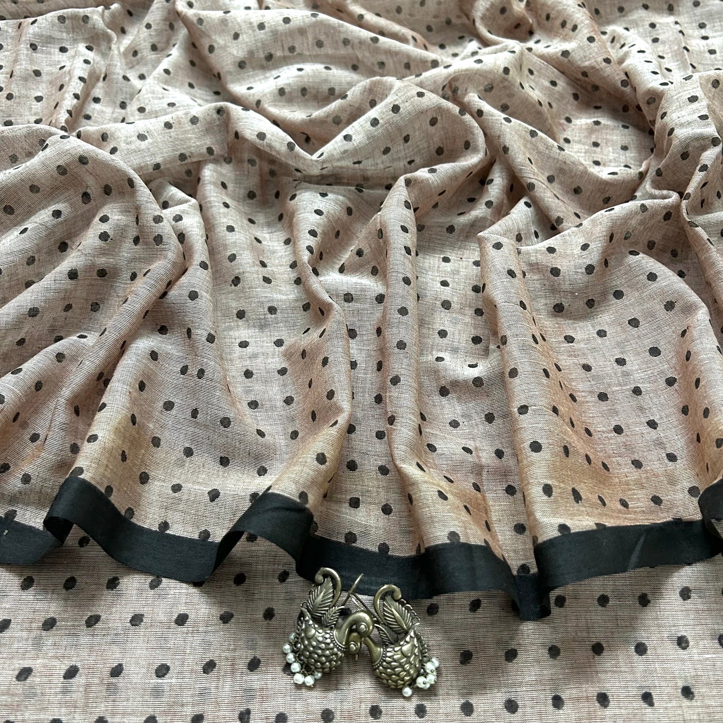Greyish beige and black polka dot mulmul saree