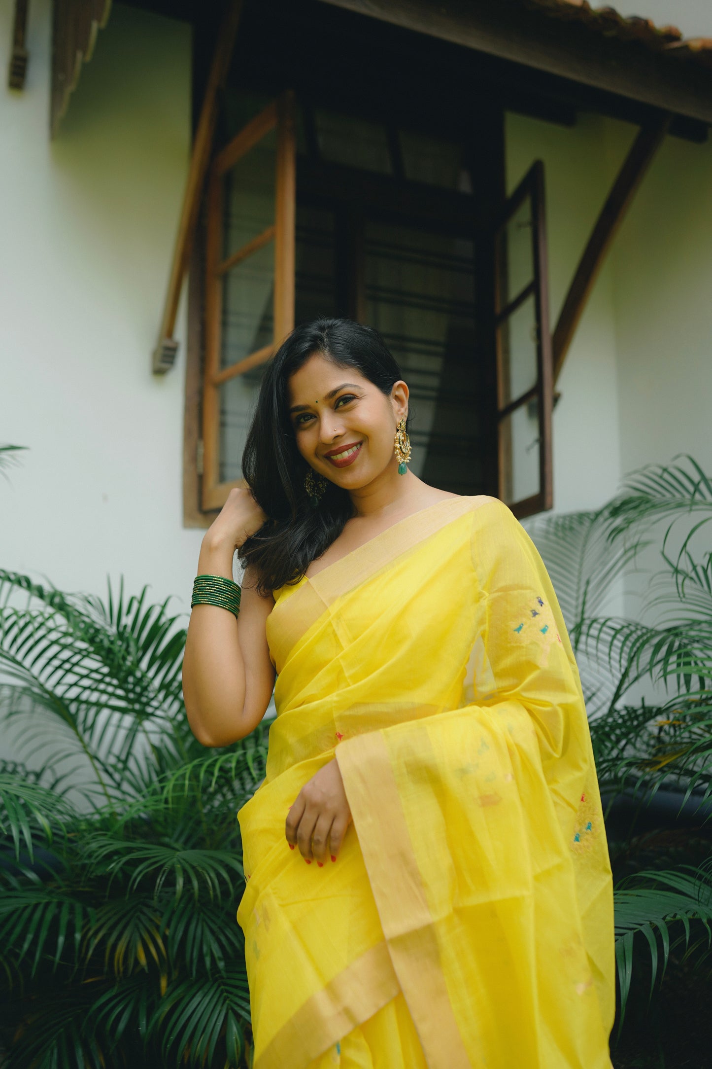 Yellow Chanderi saree with birds on tree motifs all over