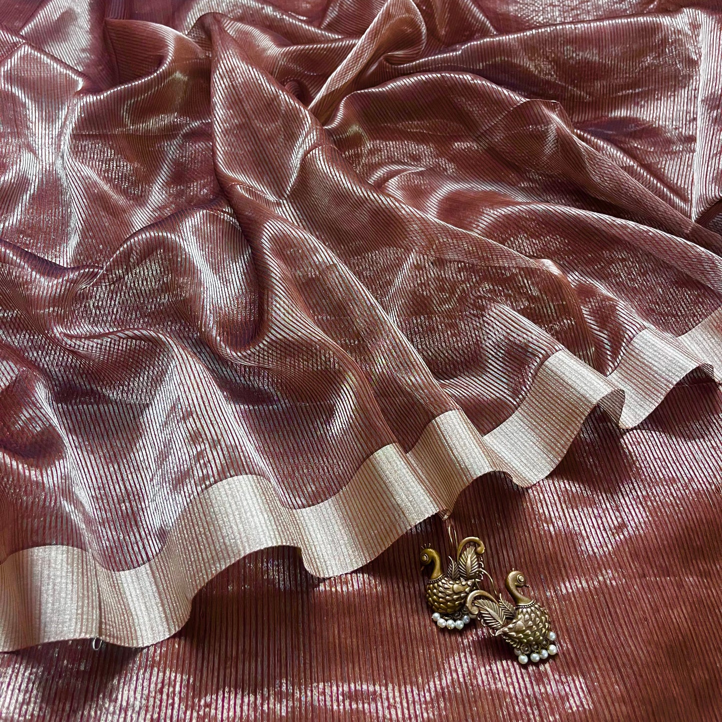 Chocolate brown Maheshwari saree with silver zari lines all over