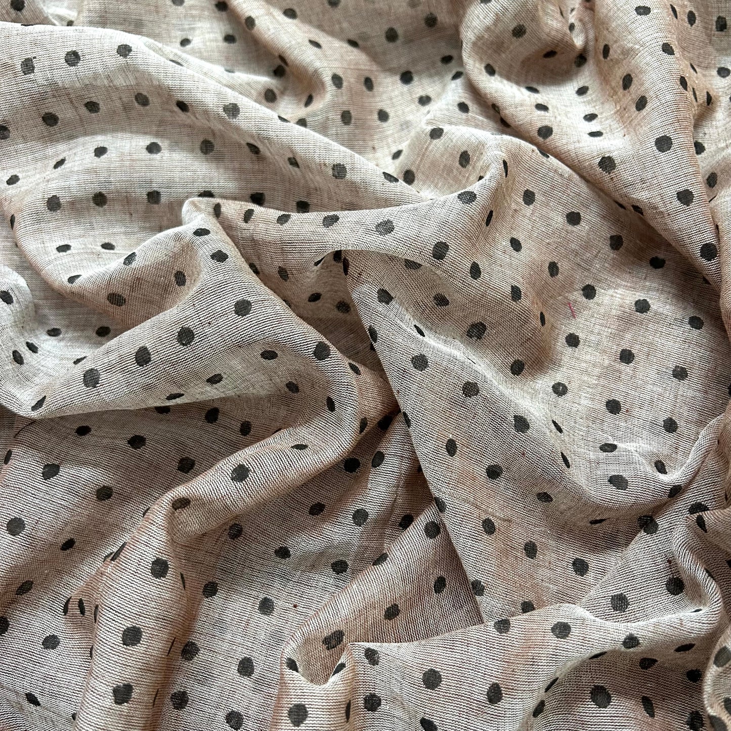 Greyish beige and black polka dot mulmul saree