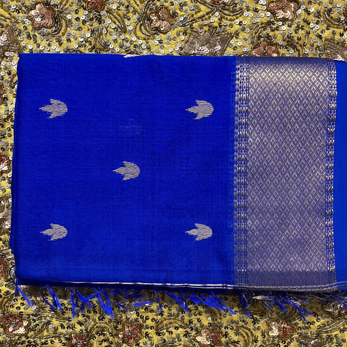 Cobalt blue Maheshwari saree with flower bootis all over