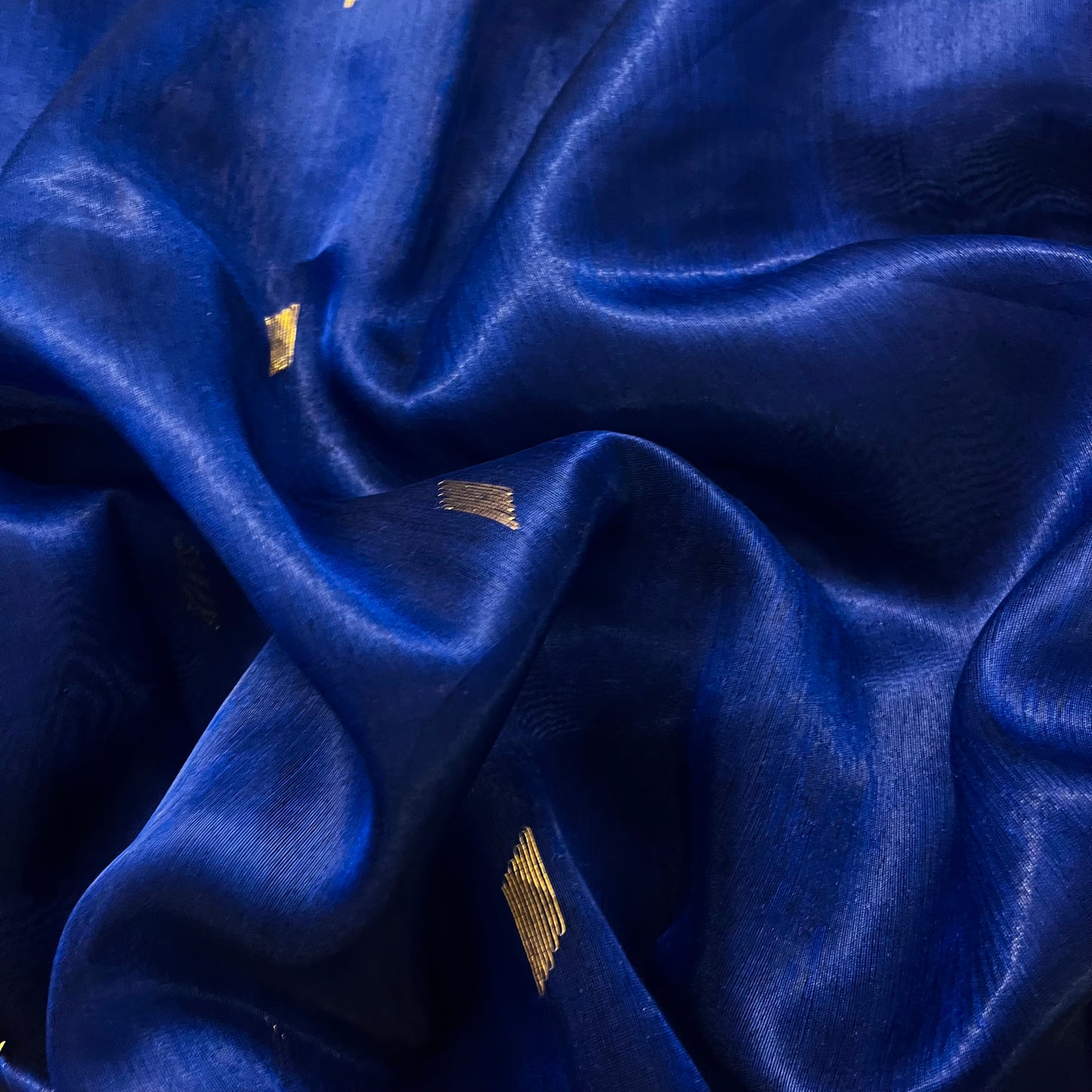 Dark blue Maheshwari tissue silk saree with zari bootis all over
