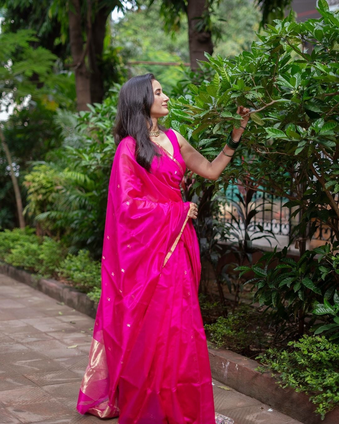 Rani pink chanderi silk saree with flower bootis all over