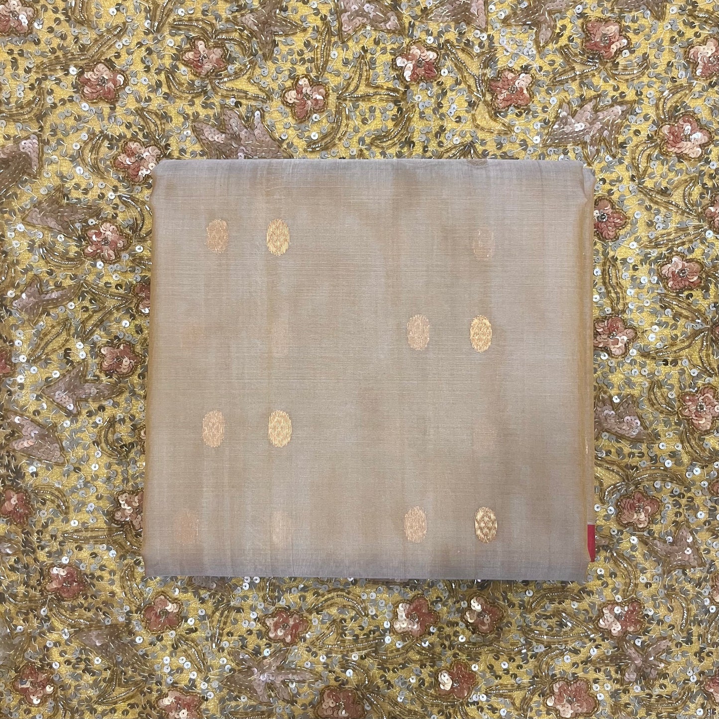 Beige gold and red Chanderi silk saree with zari bootis all over