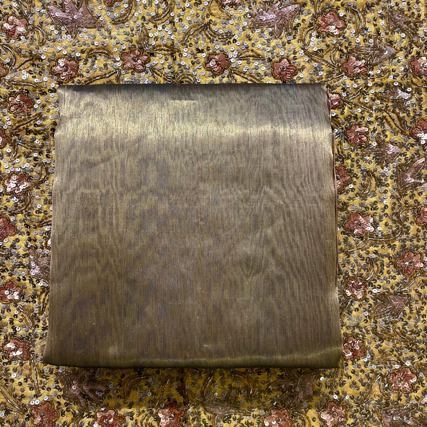 Antique gold and red Maheshwari tissue silk saree with zari pattern on pallu