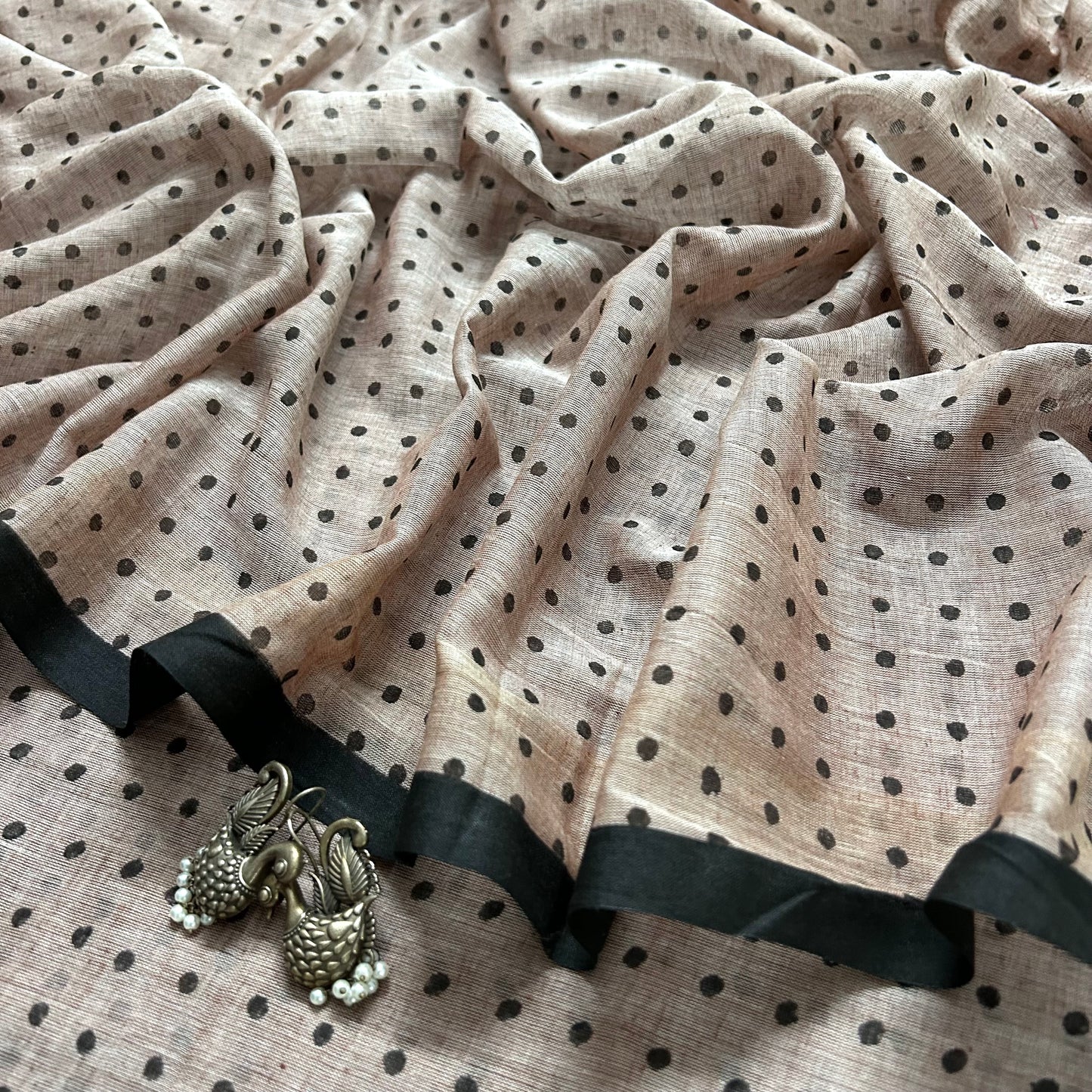 Greyish beige and black polka dot mulmul saree