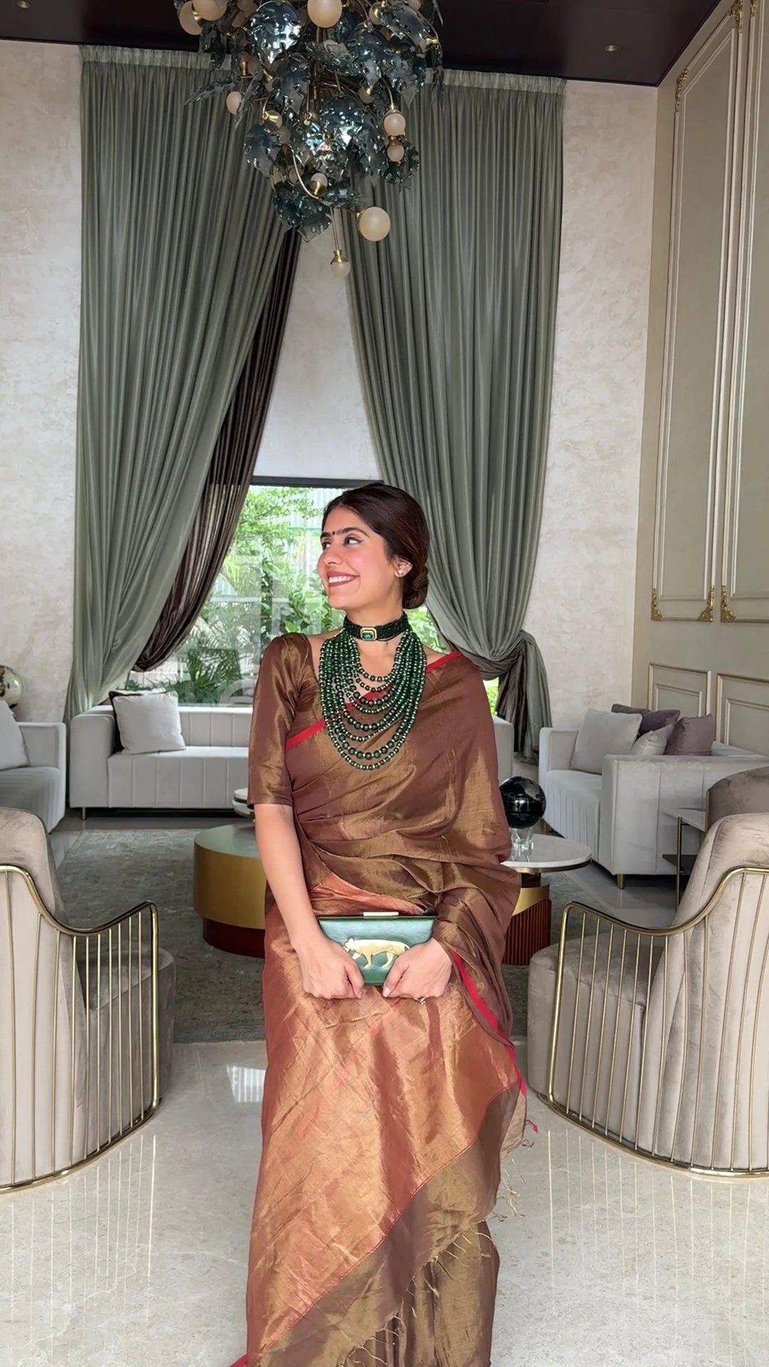 Bronze gold & red maheshwari tissue silk saree with zari lines on pallu
